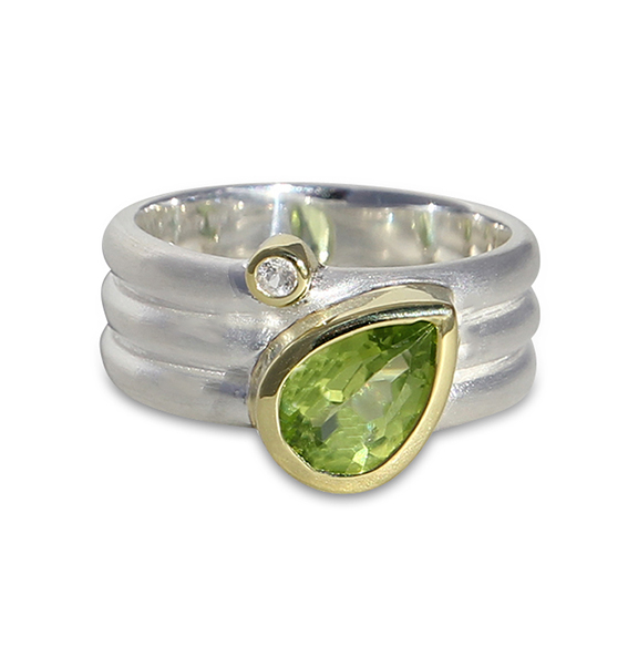 Silberring vergoldet mit Peridot und Bergkristall